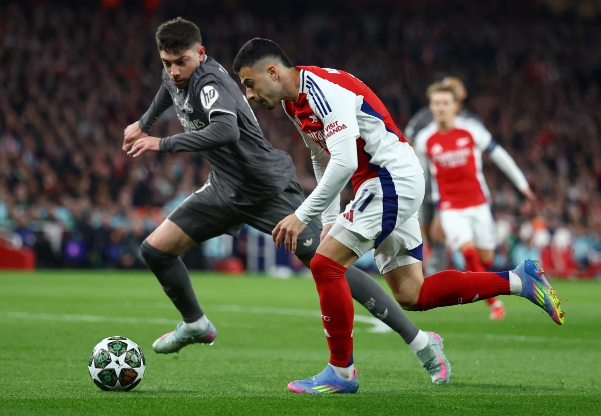 Arsenal gi&uacute;p giải Ngoại hạng Anh c&oacute; 5 suất dự c&uacute;p C1 ch&acirc;u &Acirc;u - Ảnh 1